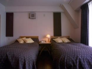 Tabiyu Abrigo Aparthotel Kobe Rum bild